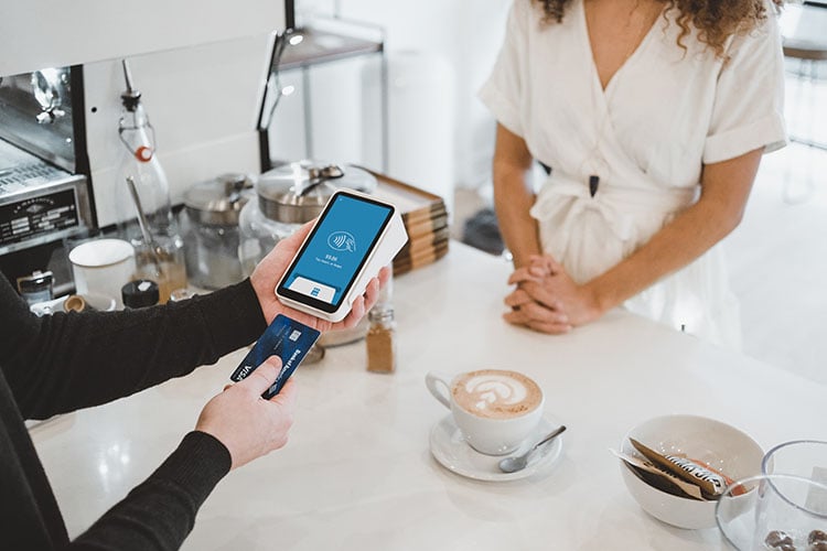 Customer paying with Square payments terminal
