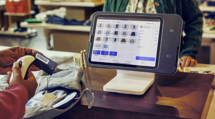 Shop owner using Square Stand to complete Order