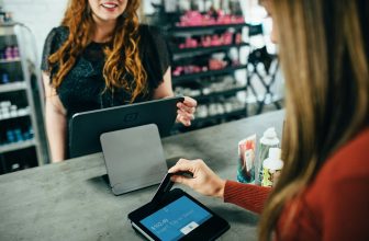Woman using POS system